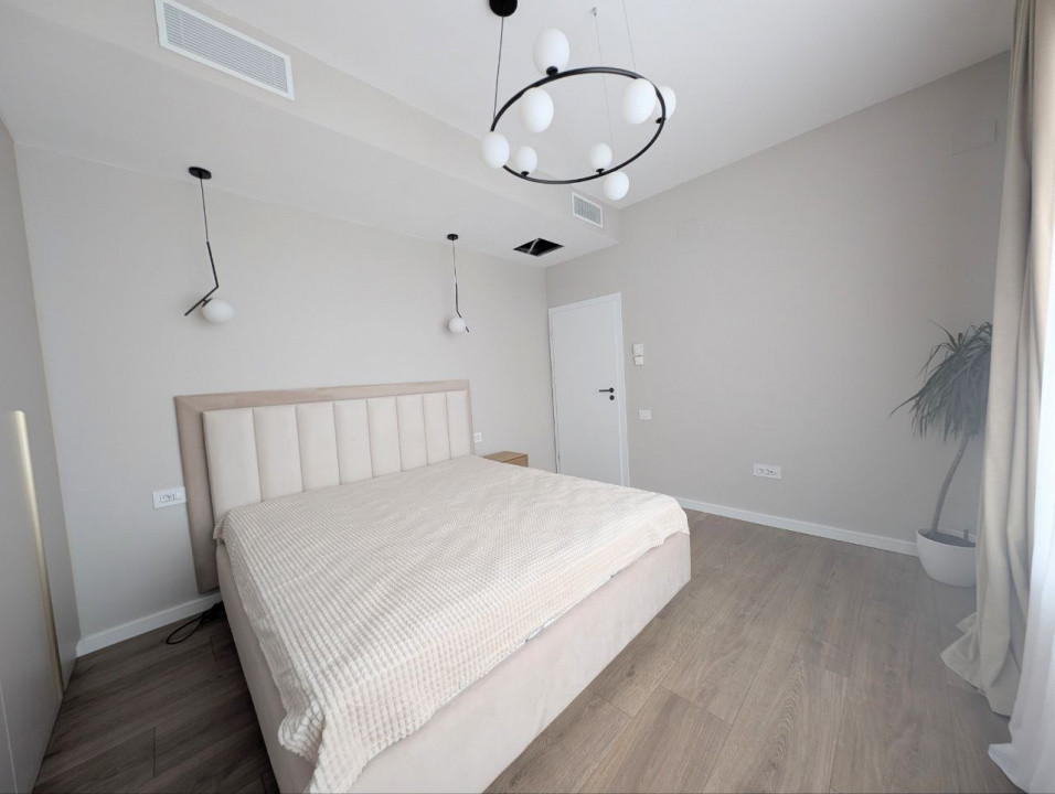 Apartament modern cu terasa - De închiriat