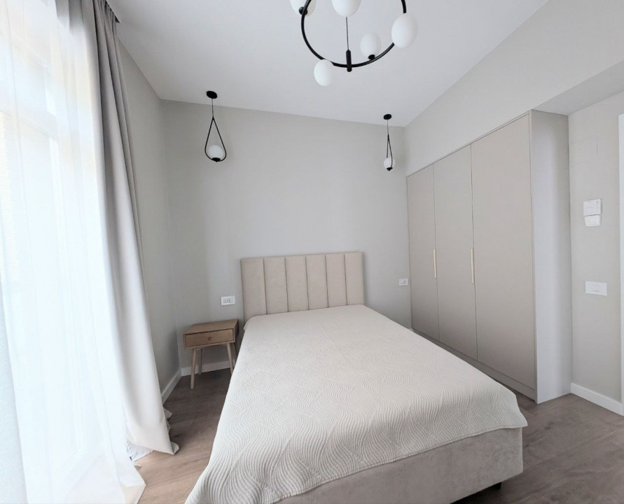 Apartament modern cu terasa - De închiriat